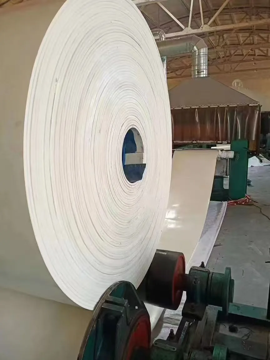 Roll of light-colored belting on a workshop support