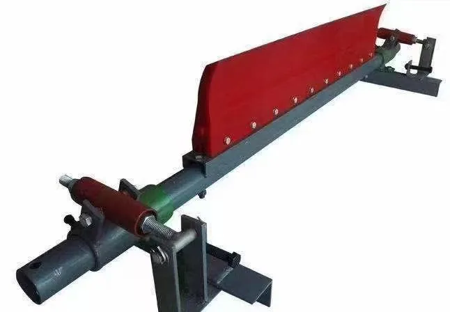 Conveyor belt scraper assembly with red blade and mounting shaft